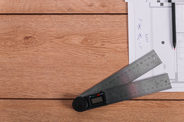 Free photo close-up ruler on blueprints