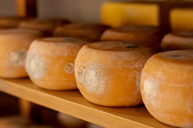 close-up rustic cheese wheels