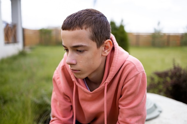 Free photo close up on sad boy portrait