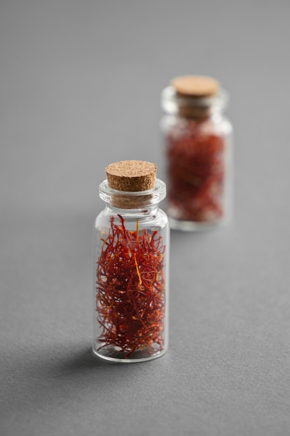 Close up on saffron in small bottles