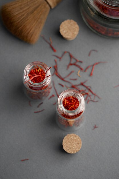 Close up on saffron in small bottles
