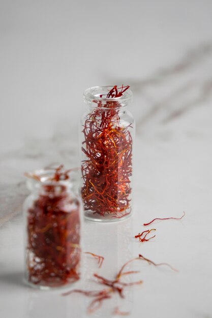 Close up on saffron in small bottles