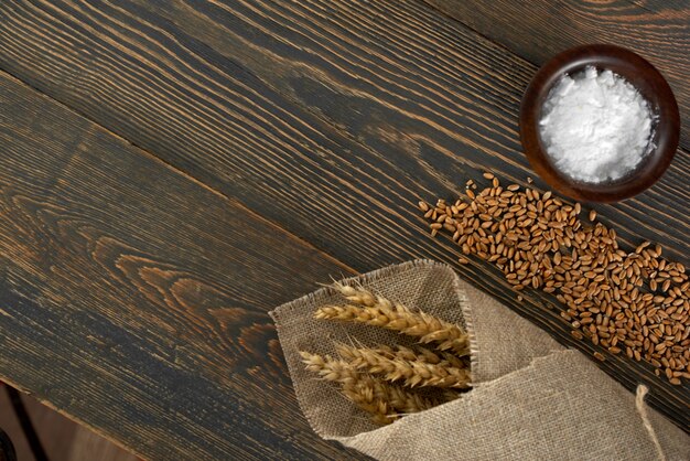 Close up of salt wheat and millet on the table copyspace bread baking cooking recipe ingredient tasty delicious produce organic natural bakery supermarket foods concept.