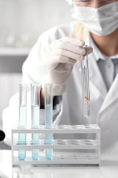 Close up scientist wearing face mask