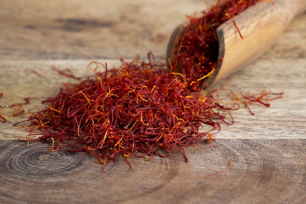 Close up on scoop full of saffron