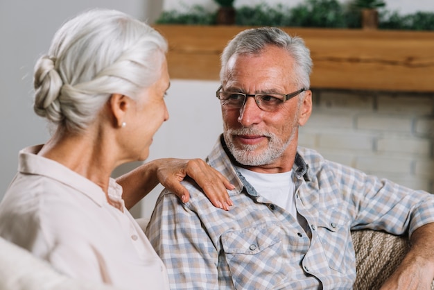 Close-up of senior couple looking at each other