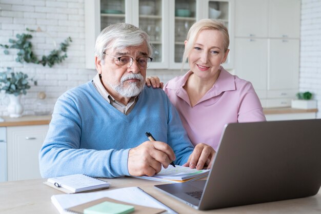 Close up on senior couple while learning