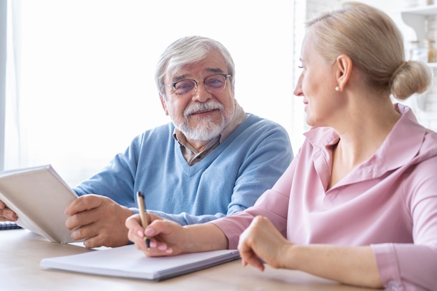 Close up on senior couple while learning