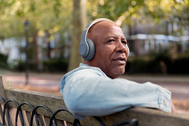 Close up senior man wearing headphones