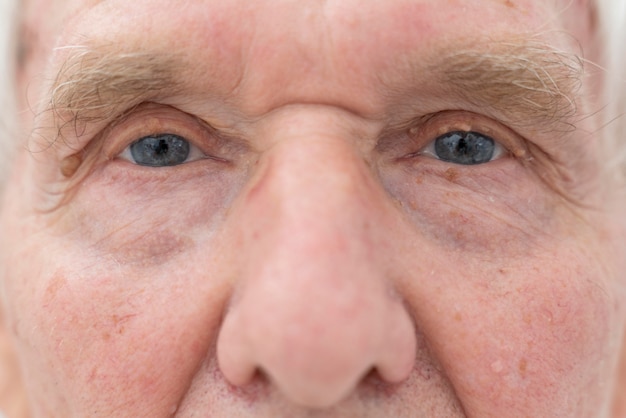 Close-up senior man with eye sight problems