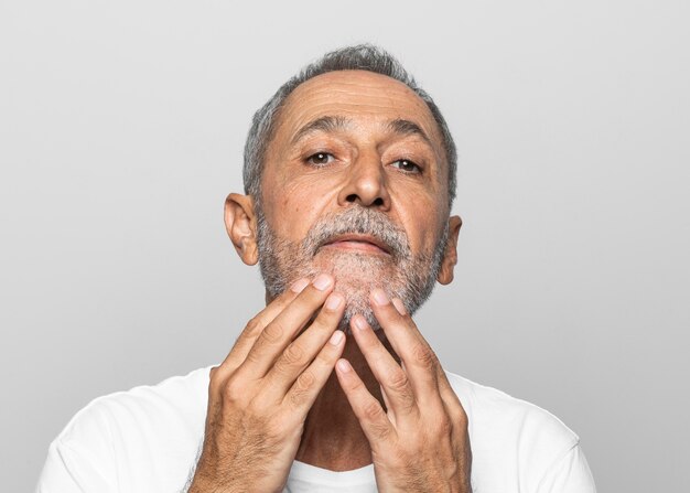 Close-up senior man with grey hair