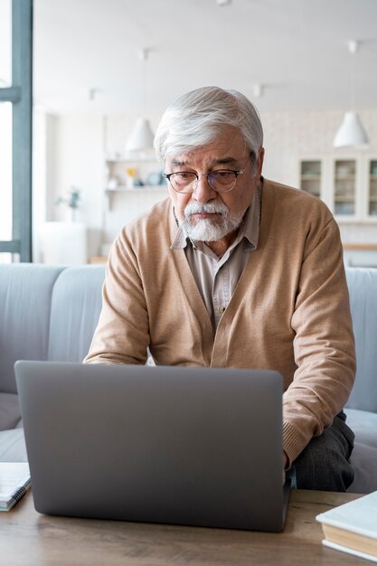 close up on senior person while learning