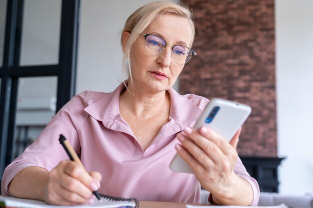 Close up on senior person while learning