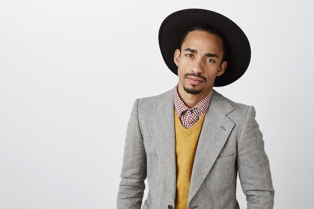 Close-up of serious-looking african-american businessman in stylish suit