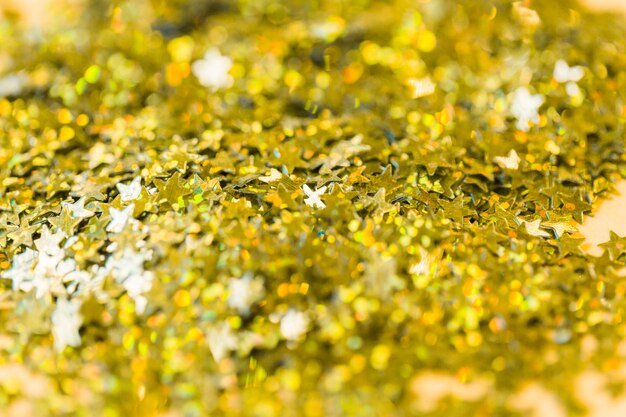 Close-up shiny star-shaped confetti