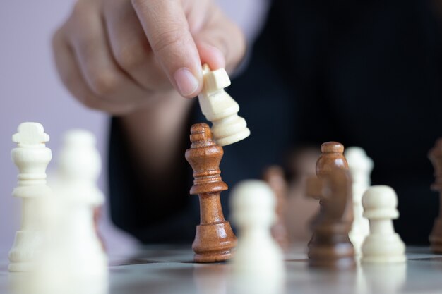 Premium Photo Close Up Shot Hand Of Business Woman Playing The Chess Board Select Focus Shallow Depth Of Field