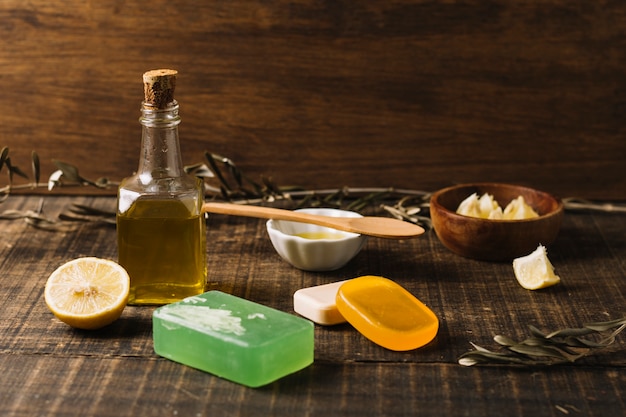 Close-up shot soap bars with ingredients around