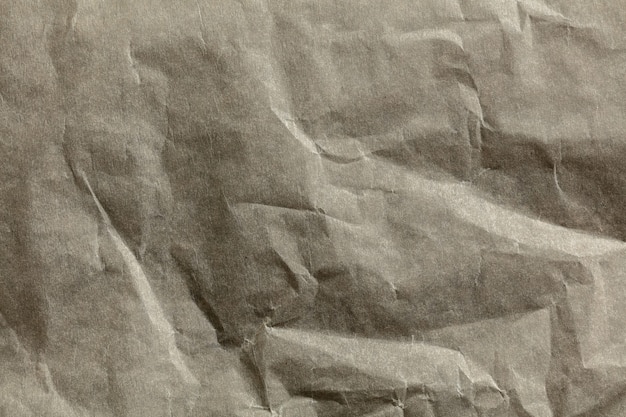 Крупным планом снимок поверхности текстуры мятой бумаги