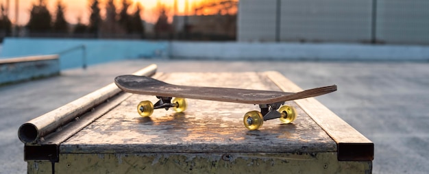 Close up skateboard on rink