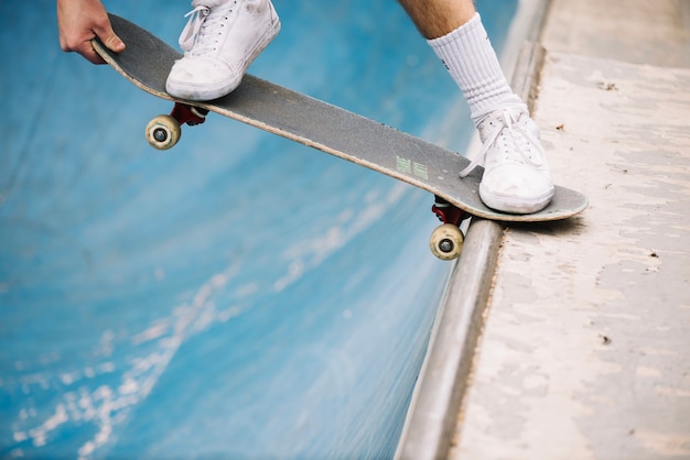 Close-up skateboarder balancing