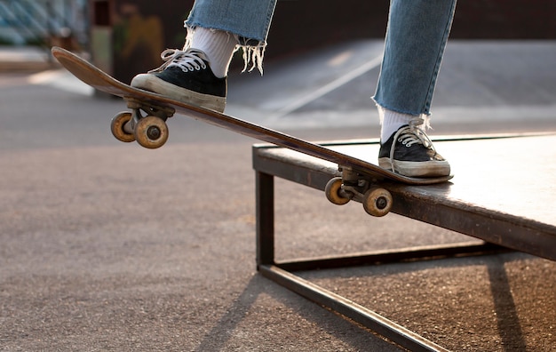 Free photo close up skater doing a trick