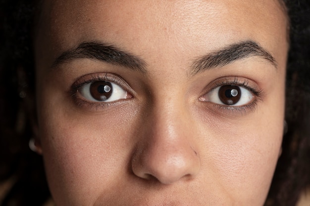 Close up on skin pores during face care routine