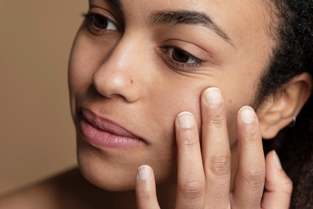 Close up on skin pores during face care routine