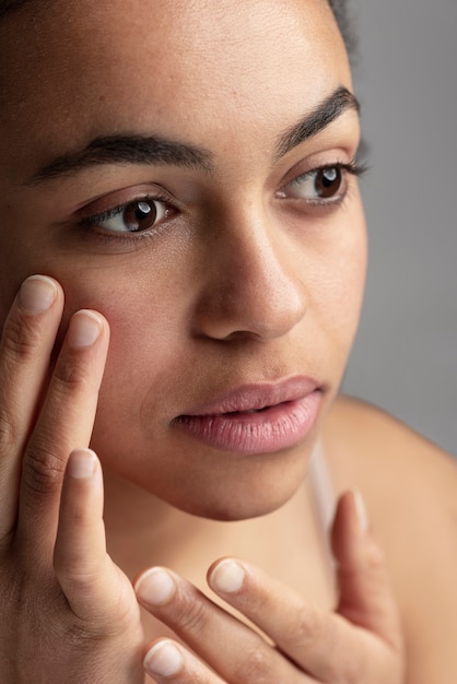 Close up on skin pores during face care routine