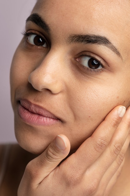 Close up on skin pores during face care routine