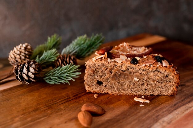 Close-up of slice of cake with pine cones