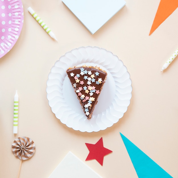 Close-up sliced cake on white plate