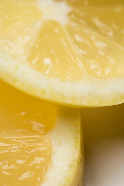 Close-up slices of sour lemon