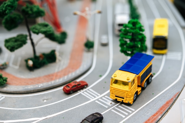 Close up of small cars model on the road, traffic conception.