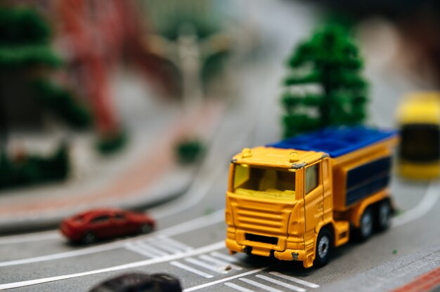 Close up of small cars model on the road, traffic conception.