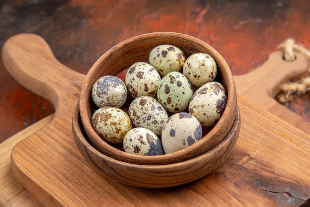 Close up on small fresh eggs in rustic decor