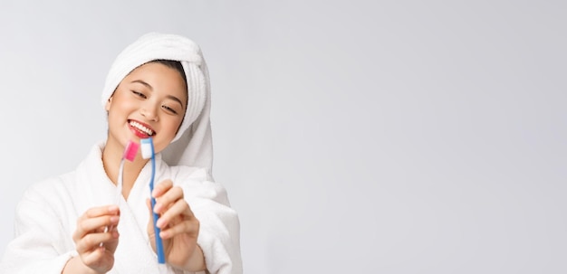 Close up of Smile woman brush teeth great for health dental care concept Isolated over white background asian