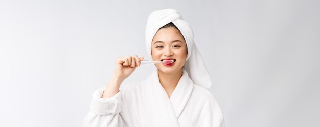 Close up of Smile woman brush teeth great for health dental care concept Isolated over white background asian