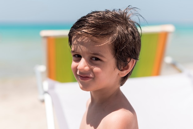 Close up smiley child looking at camera