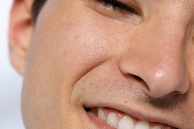 close up smiley man pores portrait