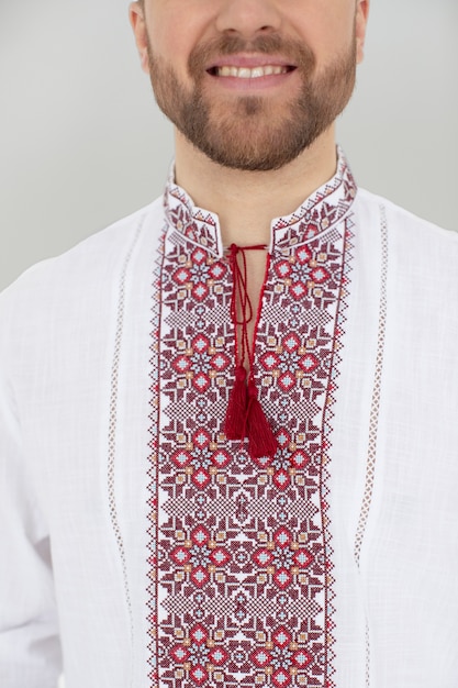 Close up smiley man wearing traditional shirt