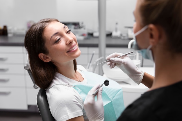close up smiley patient at dentist clinic