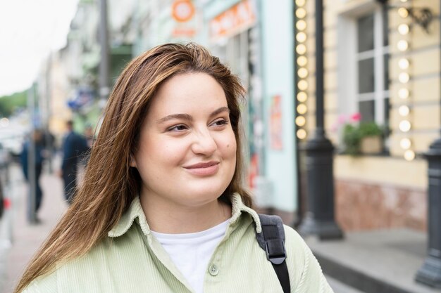close up smiley woman in city