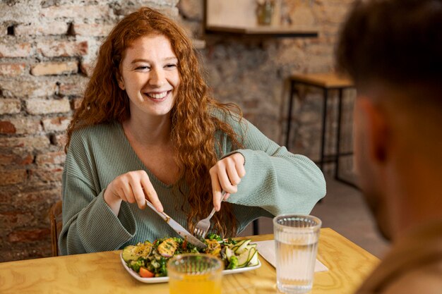 Close up smiley woman and man at restaurant