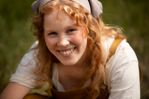 Close up smiley woman in nature