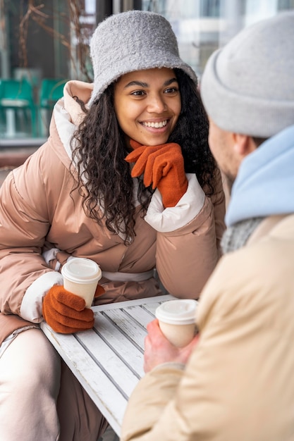 Free photo close up smiley woman outdoors