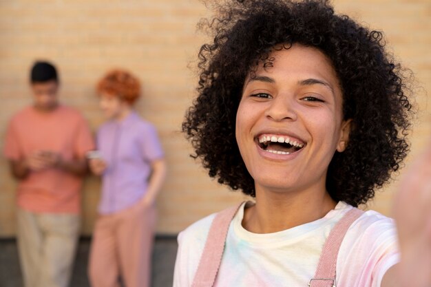 Close up smiley woman taking selfie