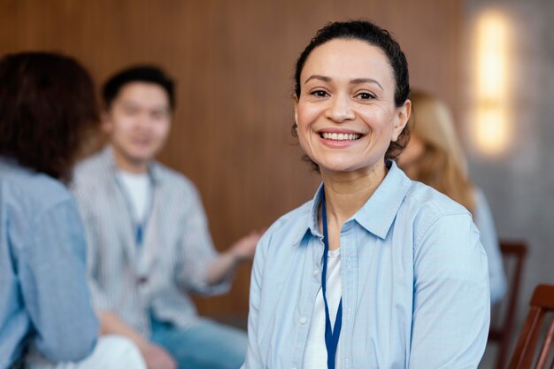 Close up smiley woman in therapy