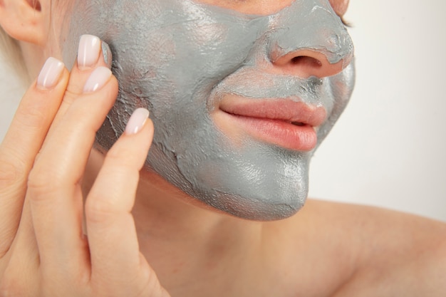 Close up smiley woman with face mask