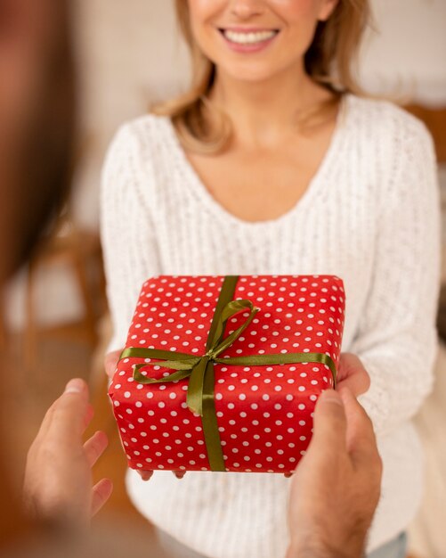 Close-up smiley woman with present