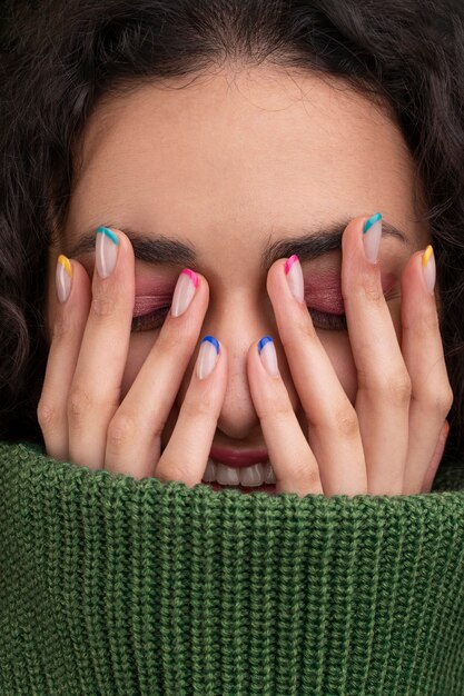 Close up smiley woman with pretty manicure